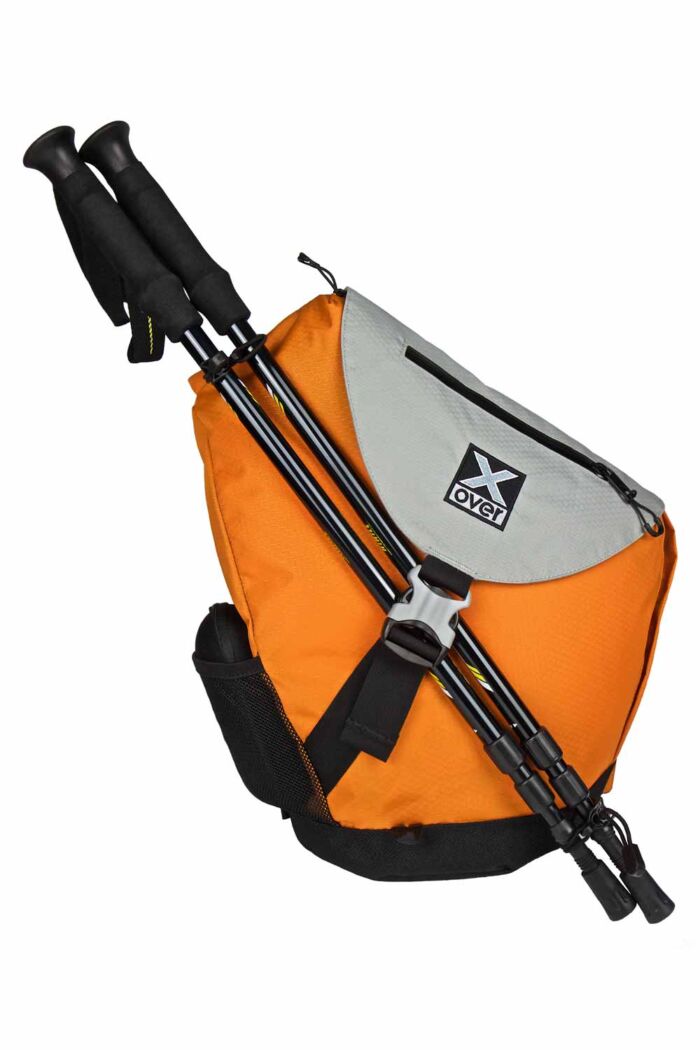 Image showing x-over bag equipped with hiking poles