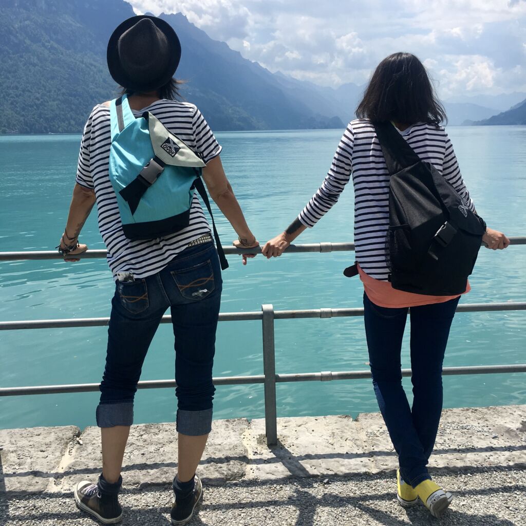 IMG_0039 Two women wearing X-over sling bags looking over a beautiful lake